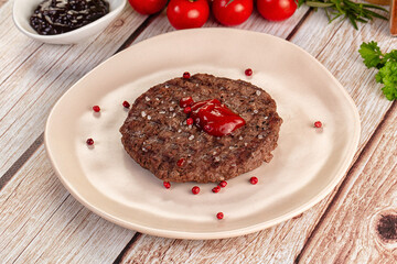 Grilled juicy beef cutlet for burger