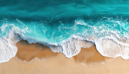Obraz premium Aerial view of turquoise waves crashing on a sandy beach.