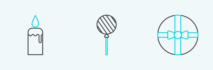Set line Gift box, Burning candle in candlestick and Lollipop icon. Vector