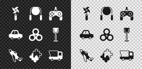 Set Pinwheel toy, Jump rope, Gamepad, Toy plane, Puzzle pieces, truck, car and Fidget spinner icon. Vector