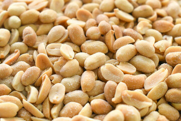Salted peanuts texture background. Healthy dietary food.