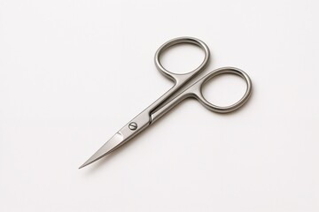 Obraz premium Elegant stainless steel scissors on a clean white background