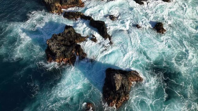 Explore breathtaking aerial views of Tenerife's rugged coastline and mesmerizing ocean waves