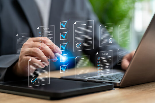 Policies documentation online, Checklist concept. Businessman checks policies document compliance, certificate, Financial details. Policy management company articles of association Quality inspection