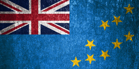 Tuvalu State Flag. Dirty Tuvalu flag on metal surface.