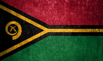 Vanuatu State Flag. Dirty Vanuatu flag on metal surface.