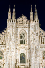 The facade of the Milan Cathedral at night