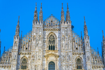 Fototapeta premium The facade of the Milan Cathedral at night