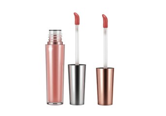 A close up of a lip gloss container with applicators on a white background in a studio setting
