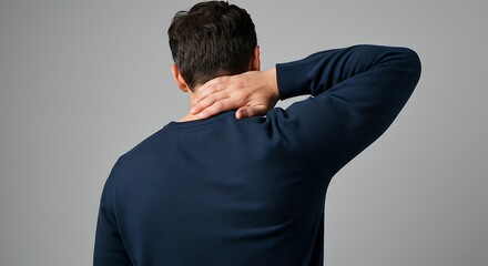 Man Touching Neck in Discomfort Isolated on Grey Background