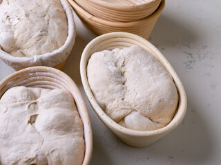 Sourdough Bread in Proofing basket, bannetons baskets for retarding raw dough before baking.