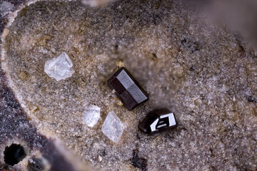 Dark Pseudobrookite crystals with clear Chabazite. Specimen from Rochessauve. Ardèche. France....