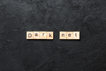 dark net word written on wood block. dark net text on cement table for your desing, concept
