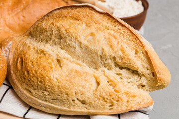 Homemade natural breads. Different kinds of fresh bread as background, perspective view with copy space