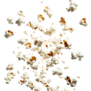 Exploding delicious popcorn isolated on white background flying popcorn cinema movies and entertainment concept salty crunchy snack food for film watching ideal for movie posters banners