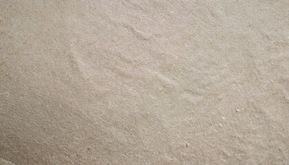 Light Beige Stone Texture: A close-up shot reveals the subtle texture and natural variations in color of a light beige stone surface.  The image offers a refined, minimalist aesthetic.