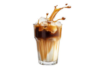 Splashing iced coffee with cream in clear glass full of ice cubes isolated on transparent background