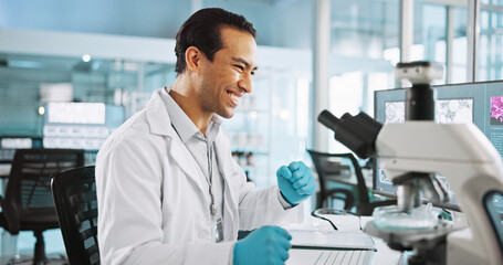 Scientist, man and microscope with fist pump for biology, breakthrough or medical research funding. Biotech, laboratory and celebration with DNA study for pharmaceutical RNA or pathology experiment