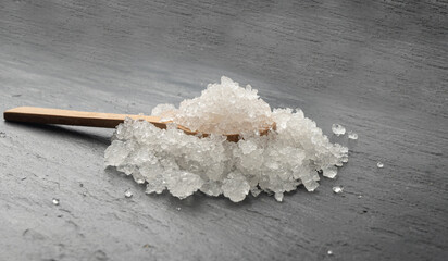 Dead sea salt pile, white crystals for body spa, sodium chloride similar to crushed ice, spa scrub