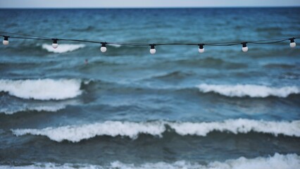 String of lights illuminating the beach of Koktebel in Crimea