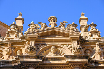 Intricate stone decorations on the exterior architecture of the