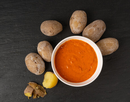 Red mojo rojo and green mojo verde sauces, traditional Tenerife dips, mojo picon dressing