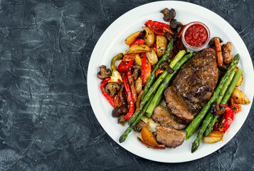 Sliced baked duck breast, barbecue.
