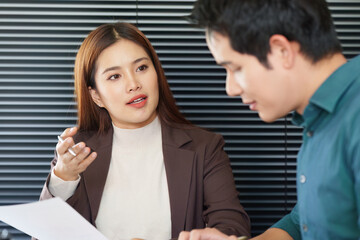 Communication and Presentation. A professional woman presenting business insights while fostering...