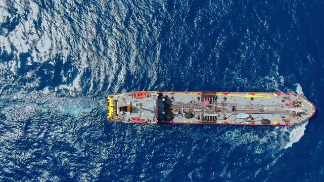 Aerial view of Oil chemical tanker sails blue sea