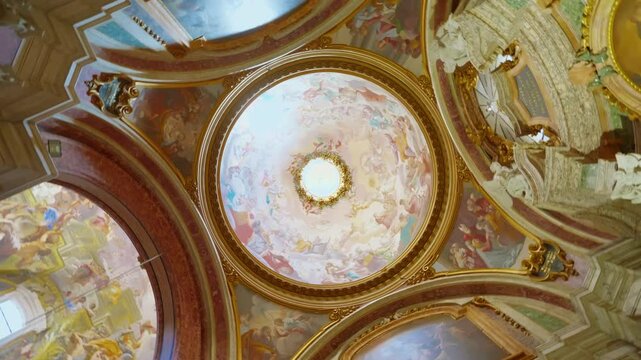 The church of Saint Ignazio with an incredibly beautiful painted ceiling and a mirror standing in it through which you can see the painting of the ceiling located in the very center of Rome, Italy