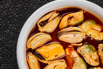 Mussels canned seafood appetizer dish organic product fresh tasty gourmet food background on the table rustic food top view copy space keto paleo pescetarian diet vegetarian food