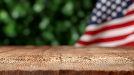 Wooden tabletop with blurred american flag background