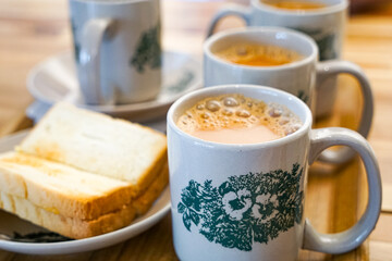 Popular drink in Malaysia called Teh Tarik. It is a sweet drink made from tea with milk. Fractal on...