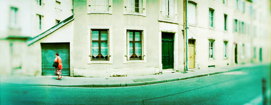 Woman walking in a street, Nancy, Meurthe-et-Moselle, Lorraine, France.