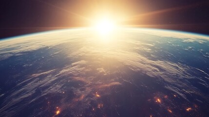 Earth from space at sunrise, showcasing continents and city lights