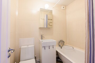 interior apartment room bathroom, sink, decorative elements, toilet