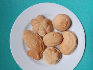 close up of fish cake. small cake. bhoi cake is one of Aceh's typical cakes that has a sweet taste, crispy on the outside and soft on the inside and various shapes such as fish, flowers, stars etc.