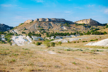 White rock mountain landscape overlooking dry valley in Crimea