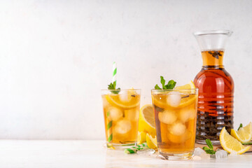 Iced tea cocktail drink, cold summer drink with black tea
