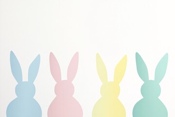 Fototapeta premium Pastel Easter Bunnies: A sweet springtime celebration with four delightful bunny silhouettes against a bright white background.
