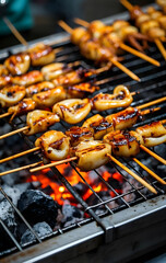 A grilled squid on a grill with a hot charcoal.