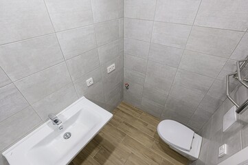 interior apartment room bathroom, sink, decorative elements, toilet