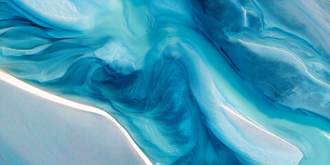 Aerial abstract view of tidal water patterns on sand
