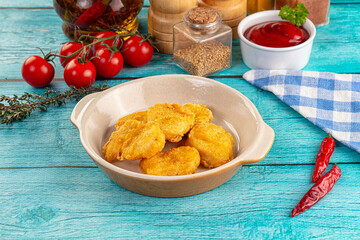 Golden crispy fried chicken nuggets