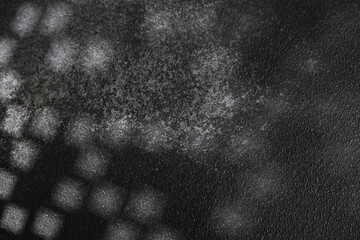 Abstract shadow on textured  dark  surface
