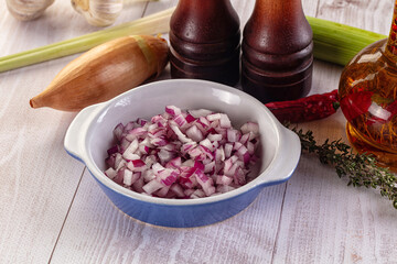 Diced red onion in the bowl