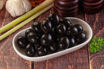 Mediterranean marinated Black olives in the bowl