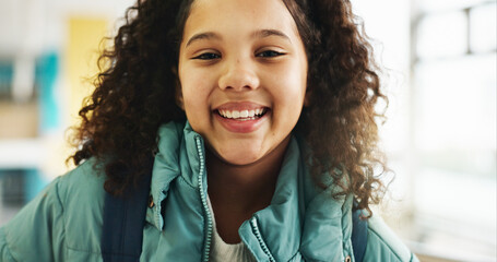 Education, portrait and student with girl in library for child development, growth or learning. Future, scholarship and study with kid learner at school for classroom lesson, course or knowledge