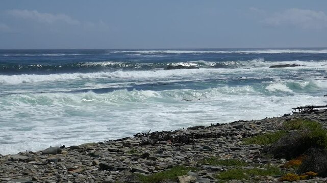 Waves in the Atlantic Ocean at former prison iland Robben Island, outside Cape Town, Western Cape, South Africa.