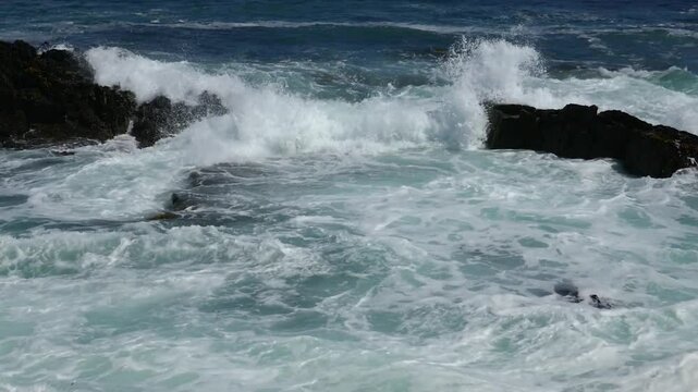 Waves in the Atlantic Ocean at former prison iland Robben Island, outside Cape Town, Western Cape, South Africa.